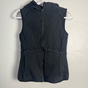 The north face black reversible black quilted hooded vest size small